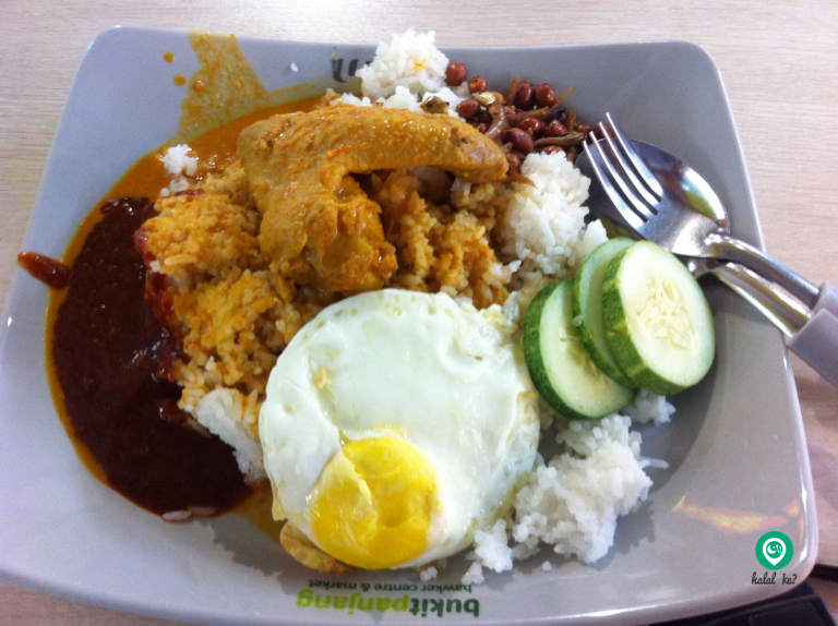 Customers can opt for Chicken Curry to go along with their Nasi Lemak at Bukit Panjang Hawker Centre, Singapore